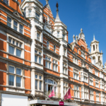 Exterior shot of Mercure Leicester The Grand Hotel, Mercure flags and signage